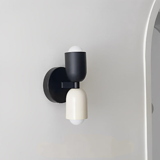 Applique murale chambre deux côtés  en blanc noir sur un mur blanc